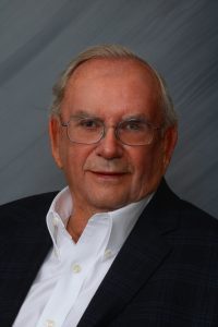 Black Jacket and white shirt picture of SHEAR, INC Chairman Charles Shear